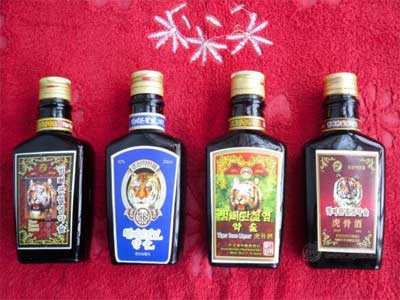 朝鲜虎骨酒多少一瓶蓝瓶好还是红瓶好，150一瓶蓝瓶含碎骨头1.jpg